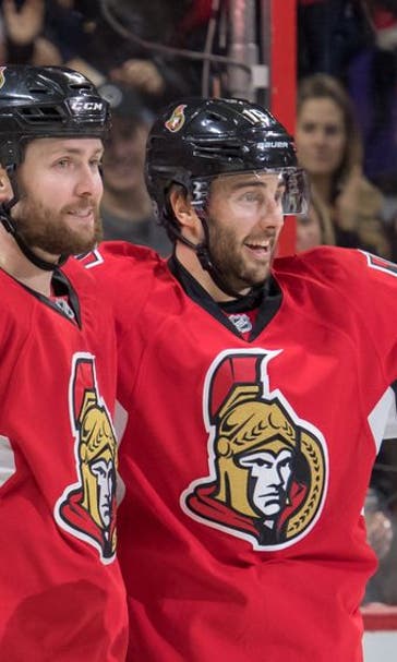 Senators end losing streak beat Devils